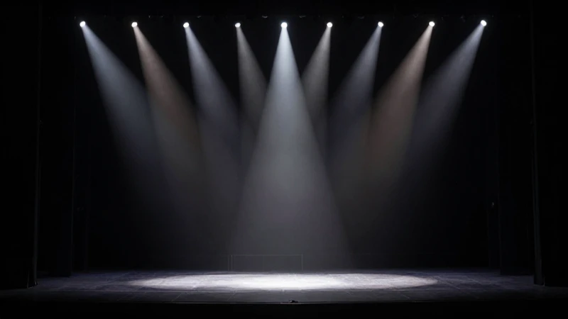 Escenario teatral iluminado con contraste dramático
