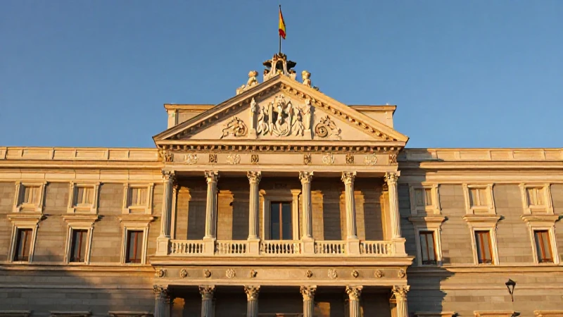 Fachada del parlamento al atardecer, bandera española